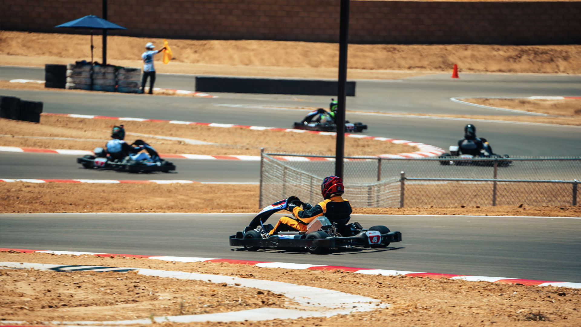 karts racing through the esses