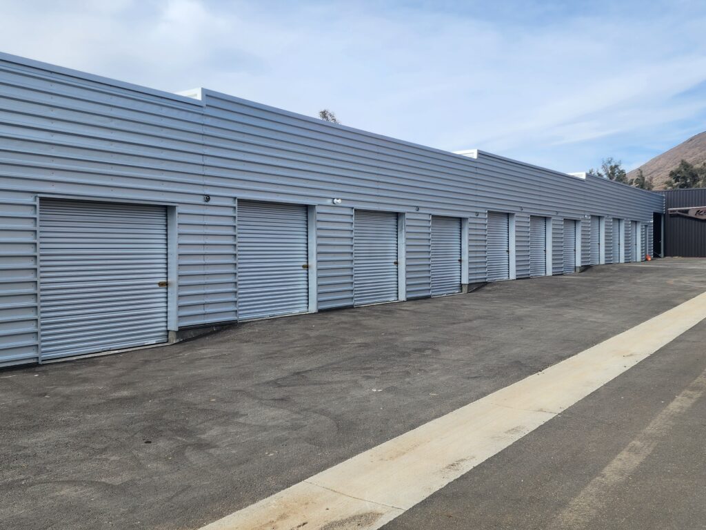 the pitlane garages at k1 circuit with bay doors down.