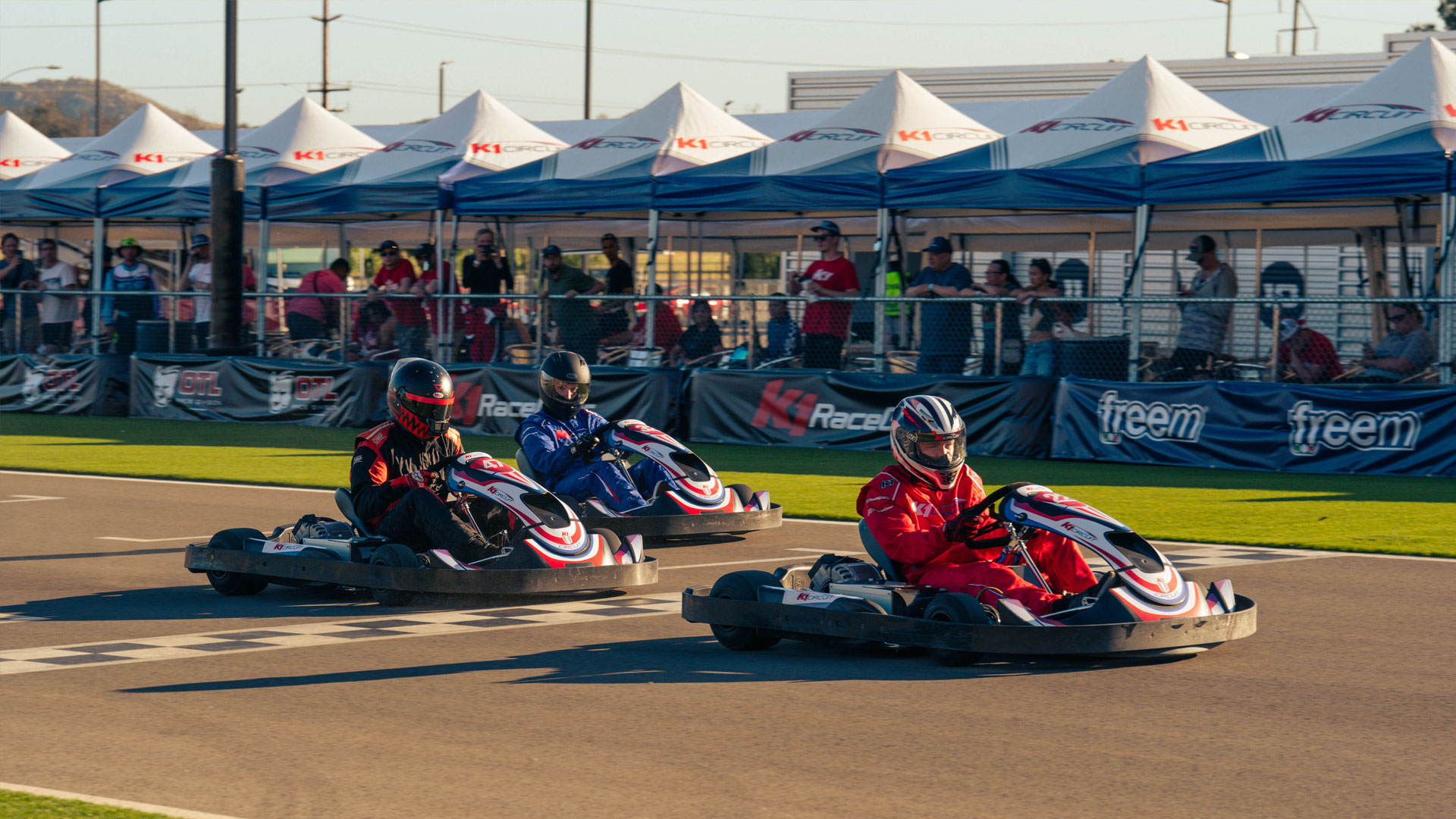 3 karts crossing finish line