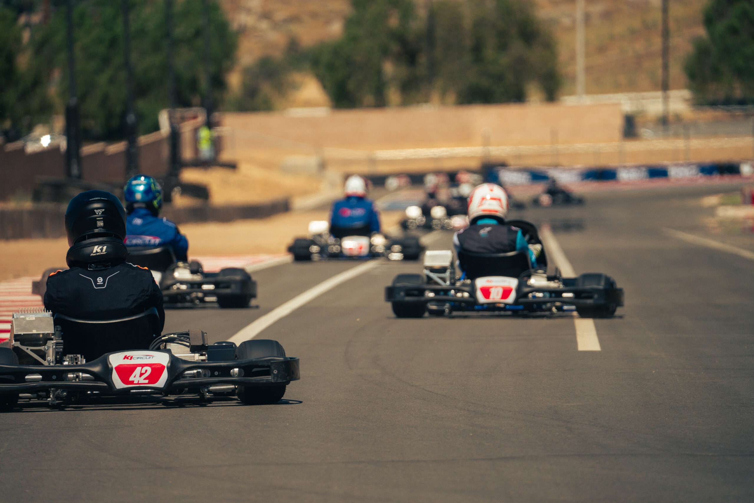 go karts racing, shot from the back at k1 circuit