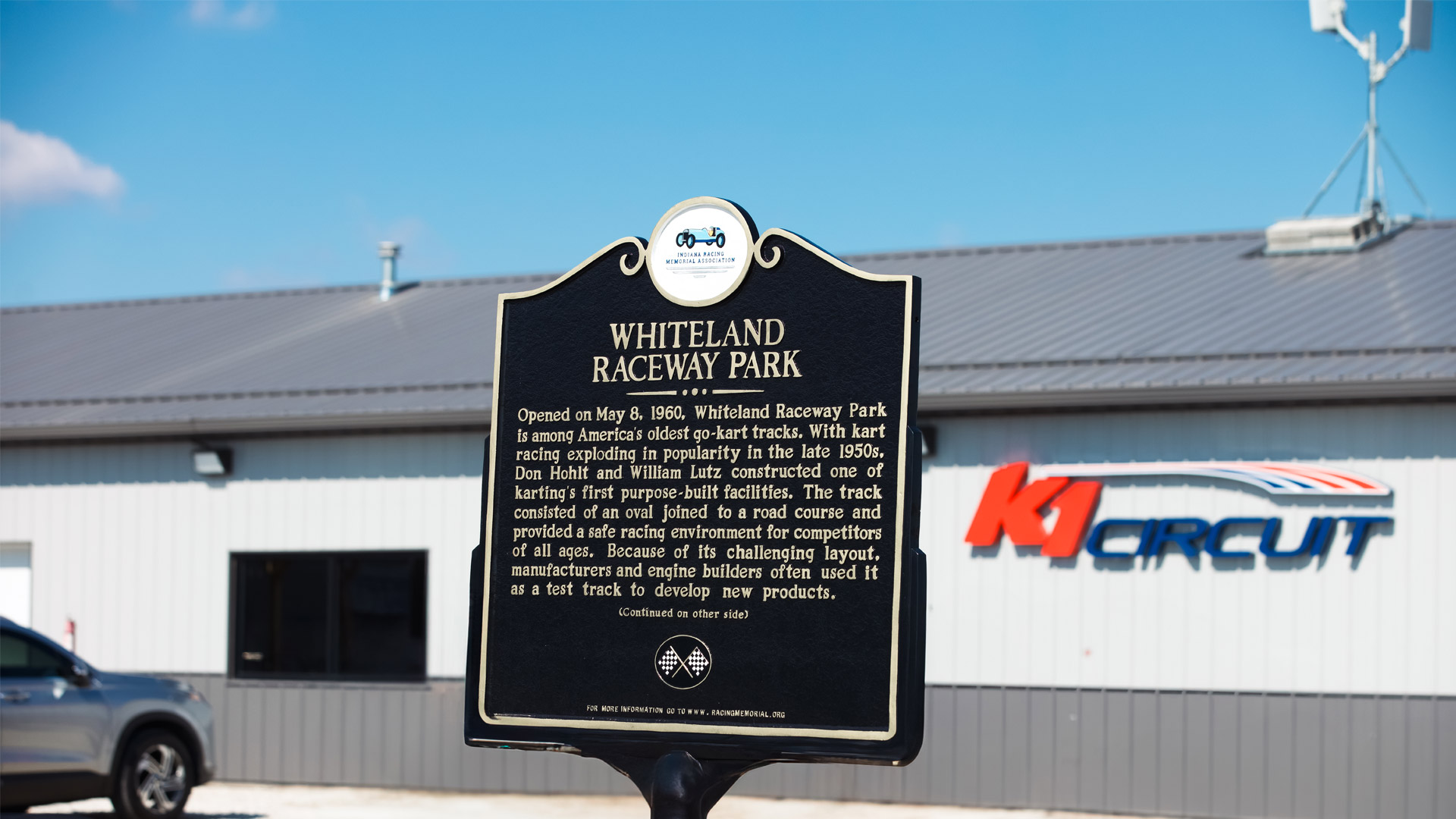 Sign outside K1 Circuit Whiteland, describing Whiteland Raceway Park's storied history.