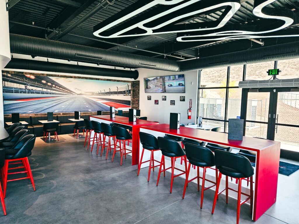 A view of the Paddock Lounge at K1 Circuit Winchester with the track layout on the ceiling