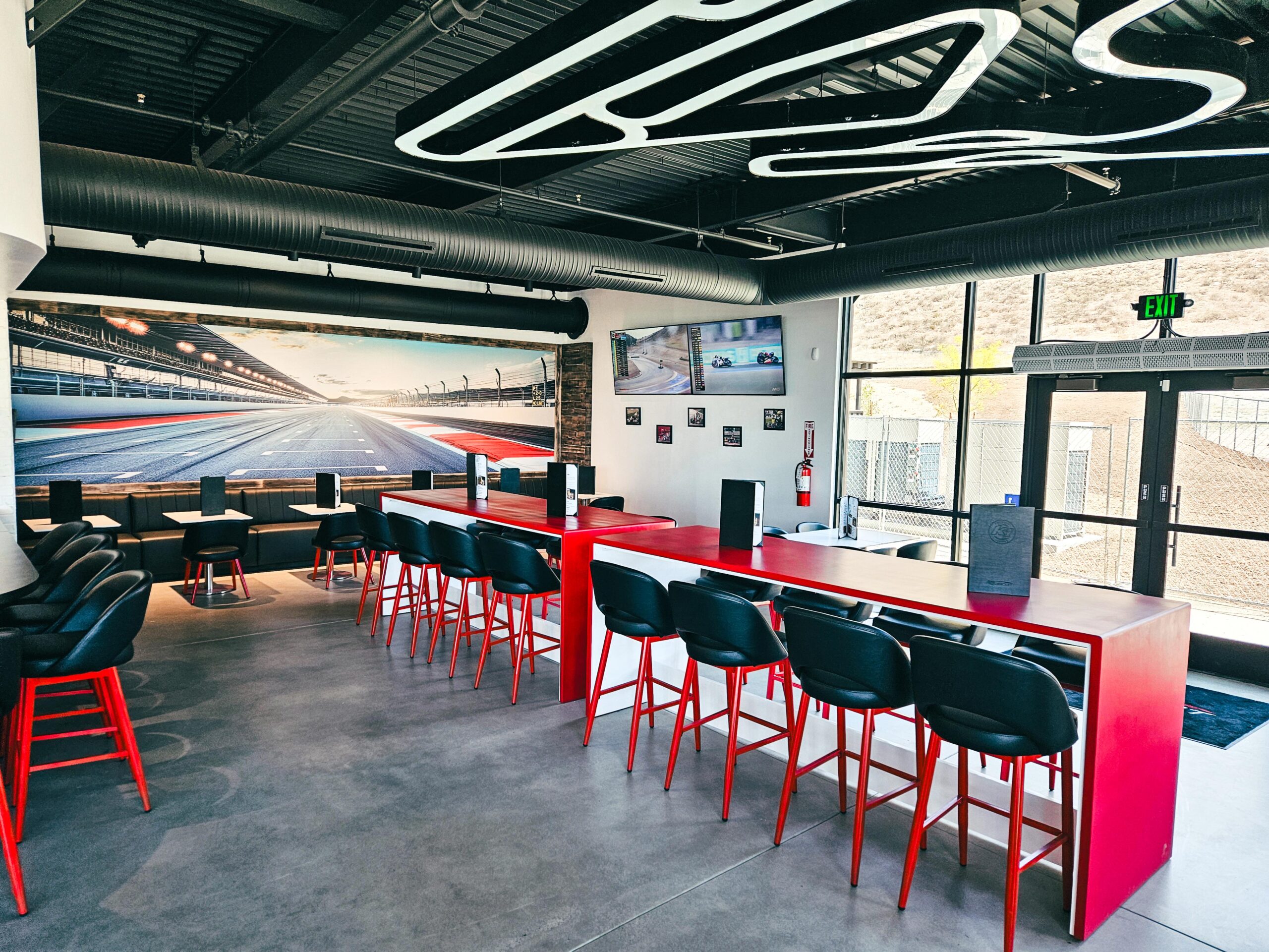 A view of the Paddock Lounge at K1 Circuit Winchester with the track layout on the ceiling