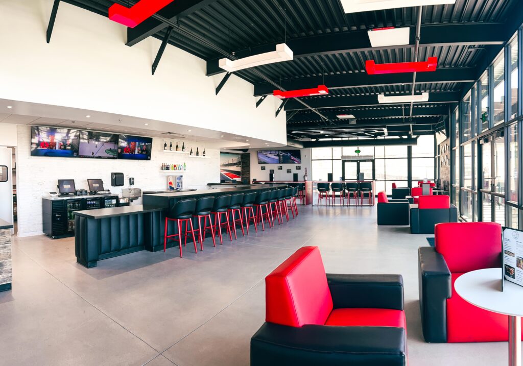 Wide shot of the Paddock Lounge at K1 Circuit Winchester with the grid layout on the ceiling