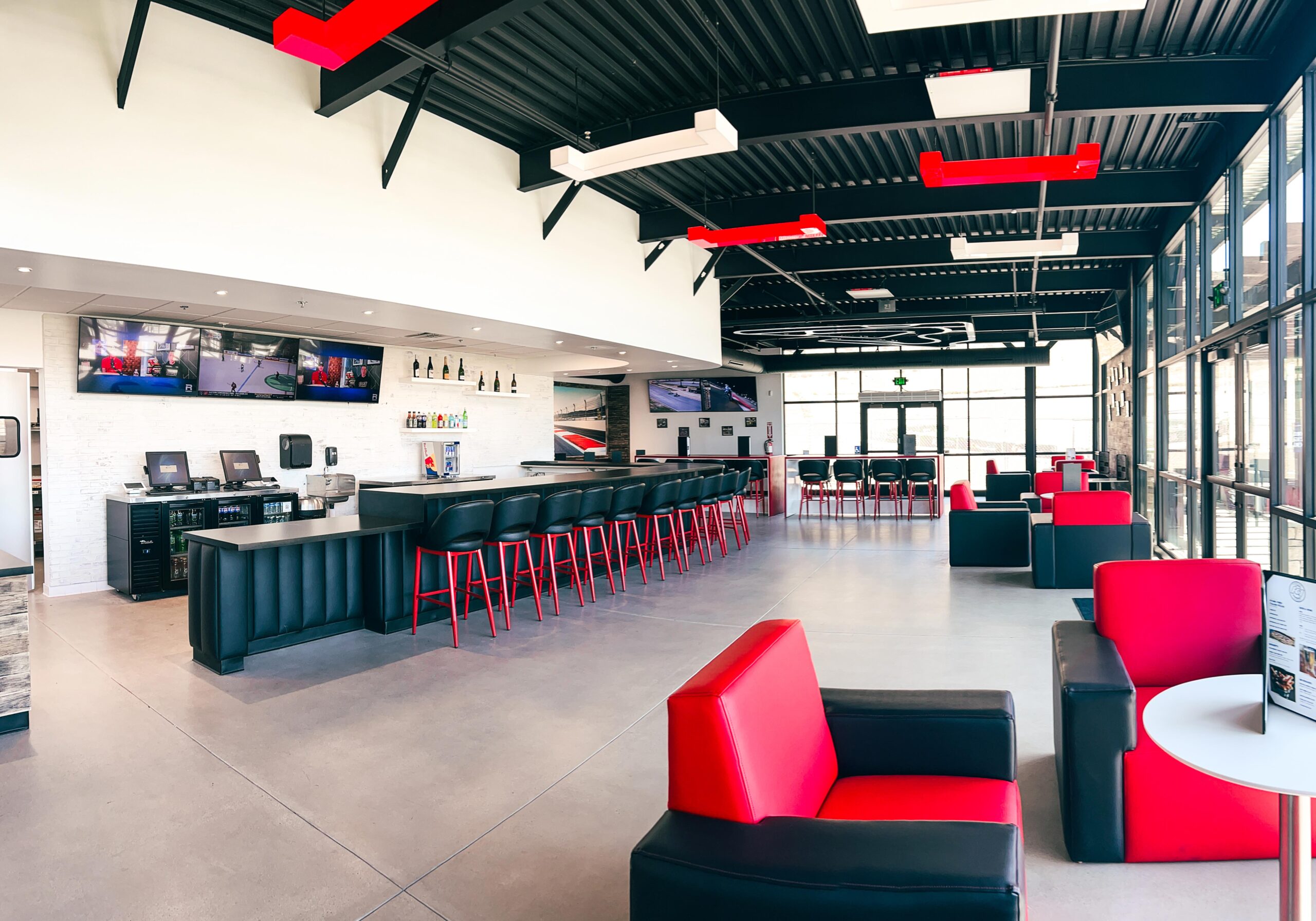 Wide shot of the Paddock Lounge at K1 Circuit Winchester with the grid layout on the ceiling