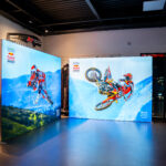 Promotional backdrops on display at K1 Circuit during a private event
